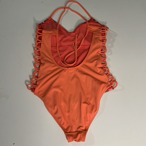 True Craft Size Med Floral One piece in Coral with Looped decorative sides. - Picture 4 of 9